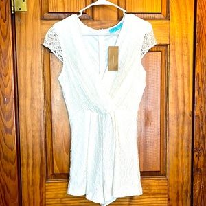 Ladies ivory and lace, medium romper by: Francesca’s.